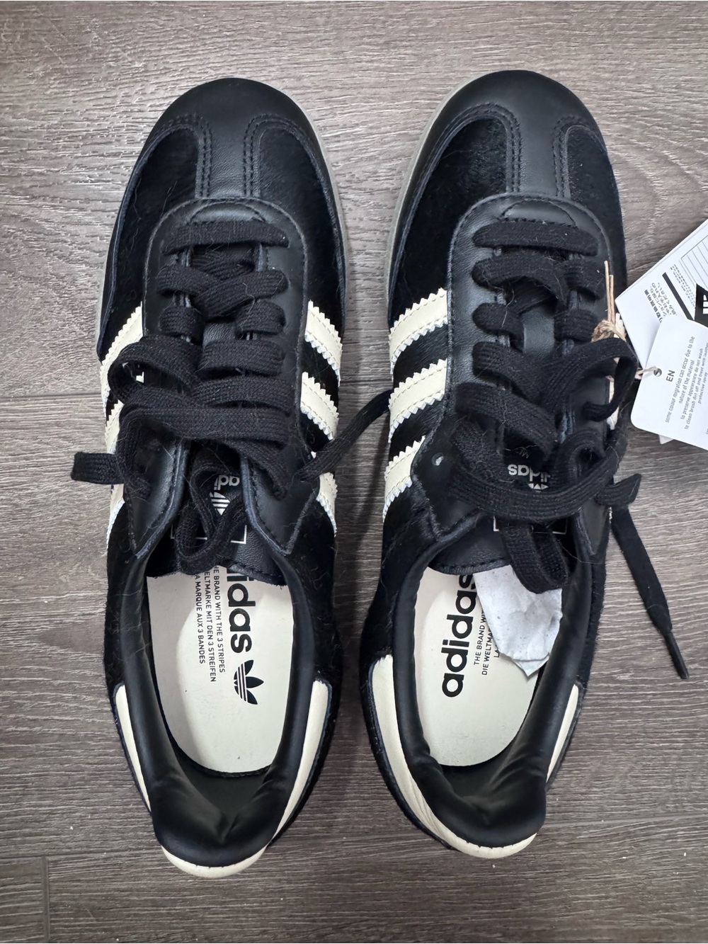 adidas Men’s Black Sneakers with White Stripes